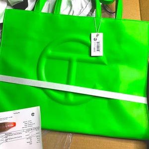 Large Highlighter green Telfar bag. You need it it’s beautiful Dust bag included